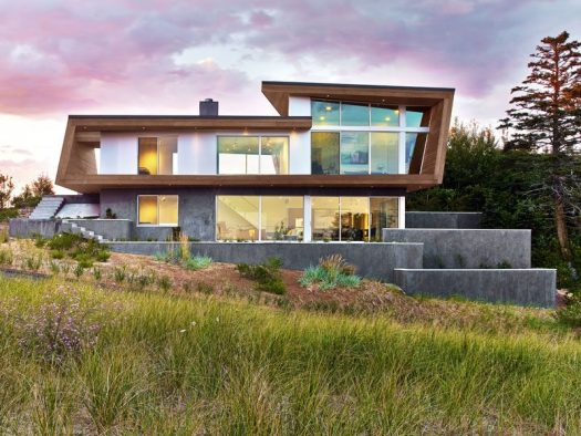 Hariri&Hariri Architecture have designed this wood-clad modern beach house in Provincetown, Massachusetts, that faces a salt marsh and a mile-long stone breakwater.