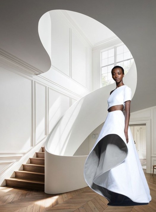 Sculptural forms emerge from the use of curves in architecture and fashion. Interior staircase in Boston residence designed by the architectural office Steven Harris Architects and Rossie Assoulin Resort 2015 collection. Image Courtesy of Viktoria Al. Lytra